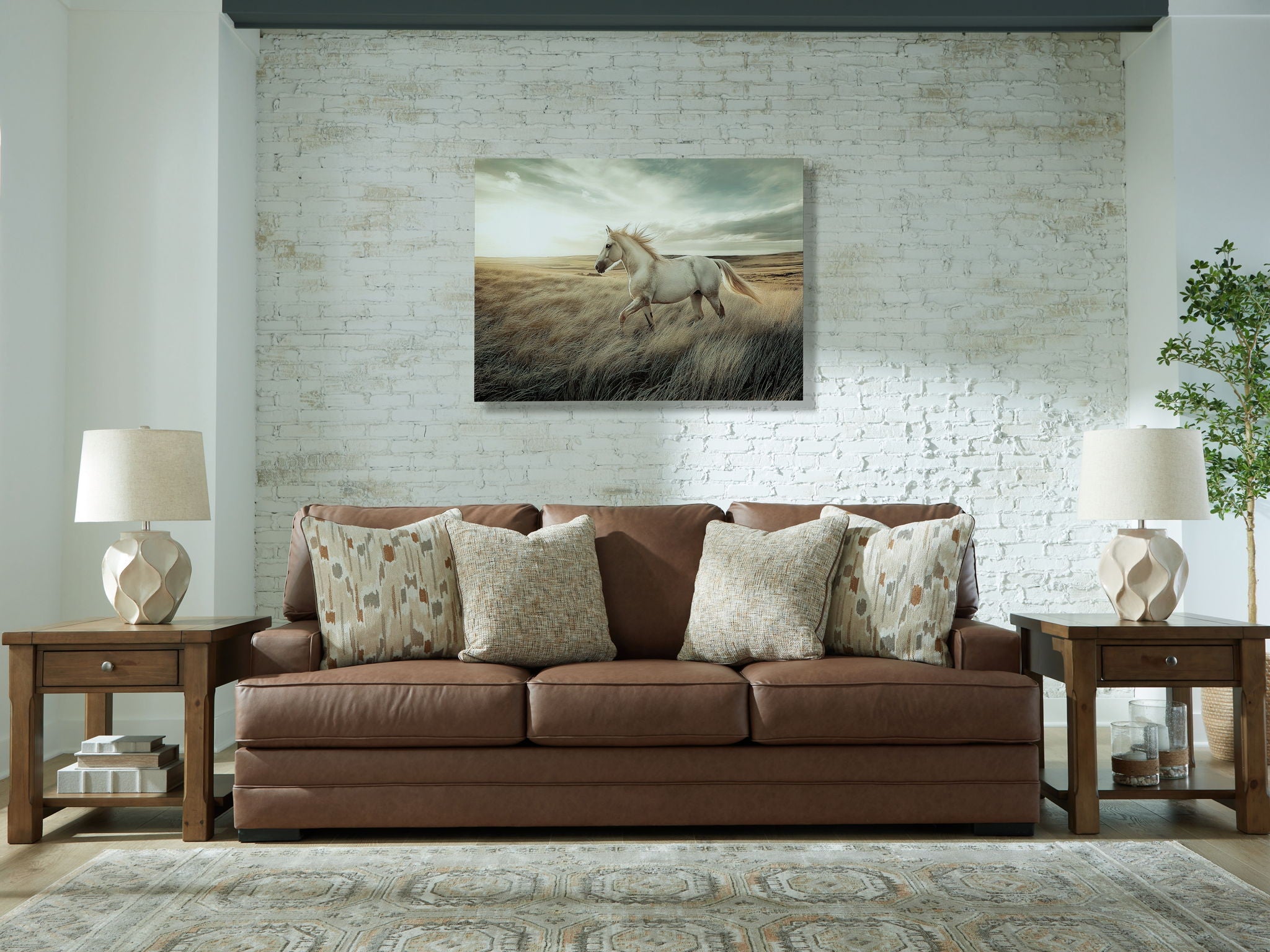 Caramel brown sofa with patterned lumbar pillows and matching textured throw cushions