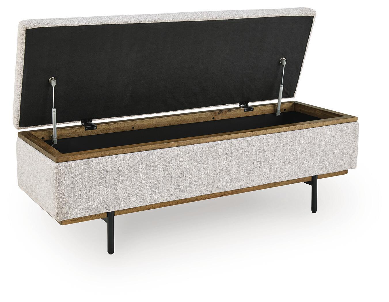 Stone storage bench with open lid, black underside, interior storage compartment visible