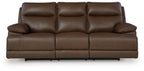 Brown power reclining sofa with three seat sections, curved headrests, and clean seam lines