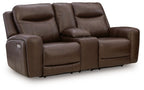 Dark brown power reclining loveseat with console, adjustable headrests, padded armrests.