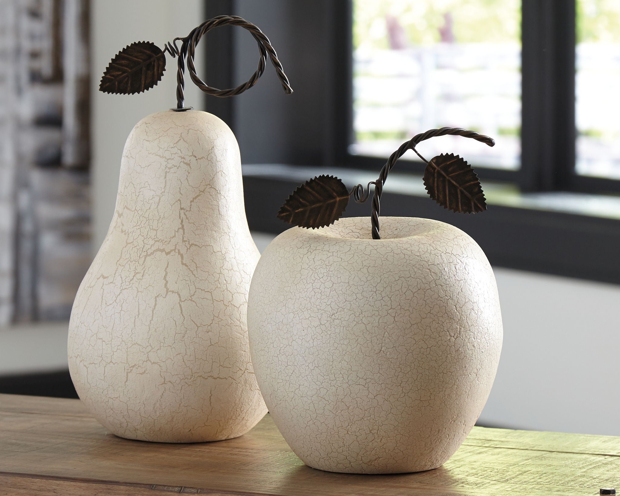 Set of 2 antique white crackle pear sculptures with black leaf cord tops