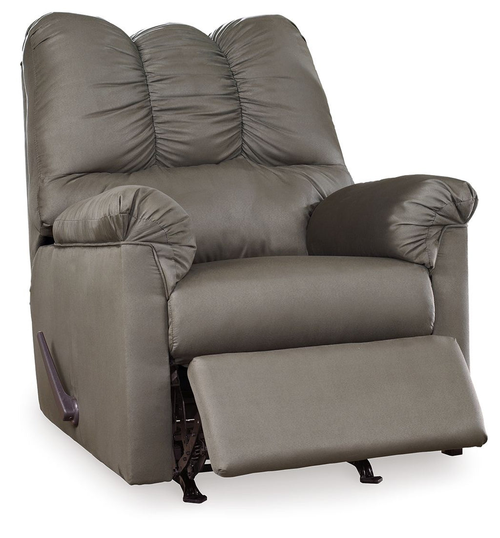 Gray rocker recliner with tufted back, padded arms, and raised footrest