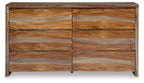 Brown wooden dresser with six drawer fronts and simple slab design