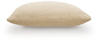 Beige lumbar pillow with textured fabric, side view