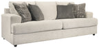 Soletren stationary sofa, light stone fabric with patterned front throw pillows