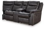 Reclining loveseat with deep cushioned seat, dark gray upholstery, contoured headrest