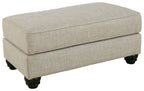 Asanti ottoman: fog beige upholstered padded seat with dark legs