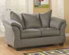 Darcy stationary loveseat in gray fabric with rolled arms and two seat cushions