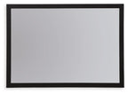Black bedroom mirror with dark frame and smooth reflective glass, horizontal rectangle