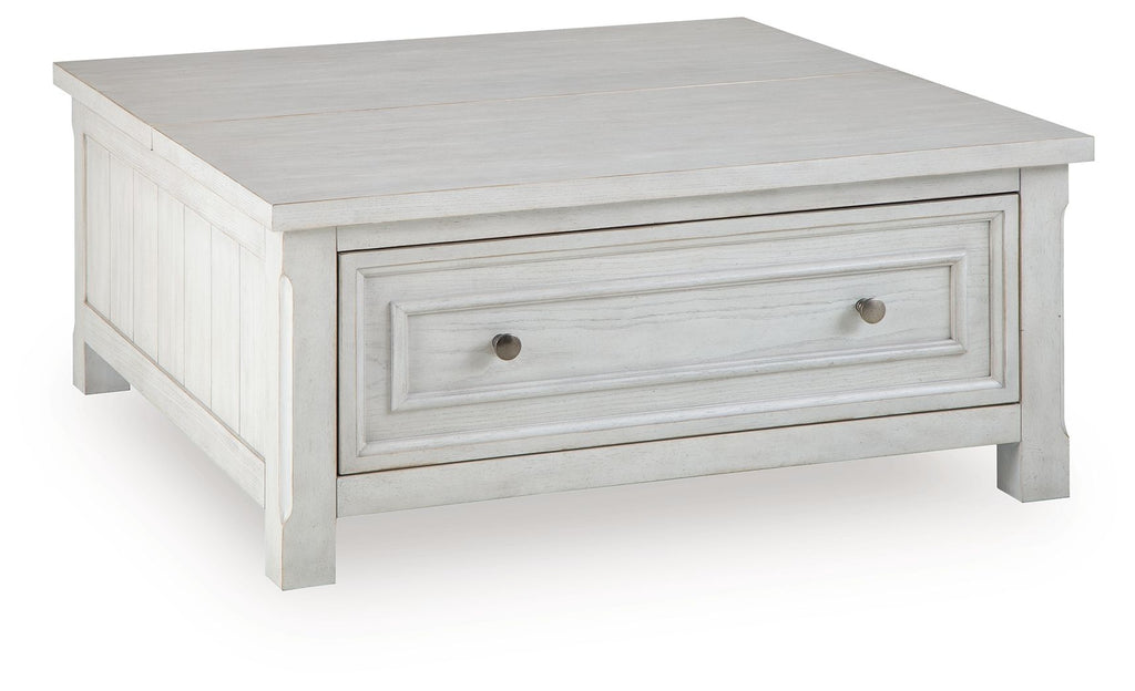 White coffee table with a smooth top and one long drawer with metal knobs.