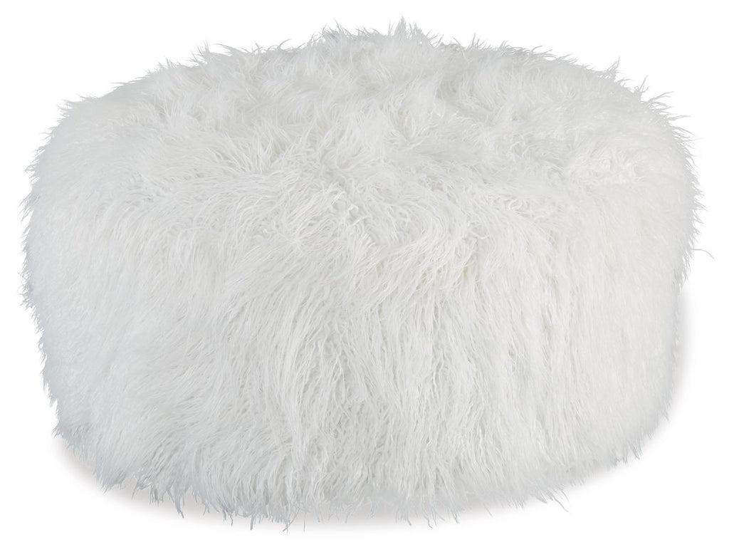 White round ottoman with fluffy shaggy faux fur upholstery