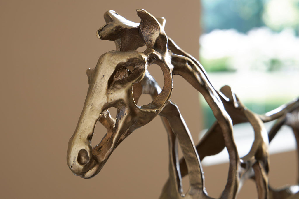 antique gold horse sculpture head and neck detail on dark base