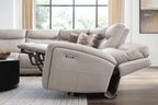Gray power recliner section of a sectional sofa with padded armrest and seat