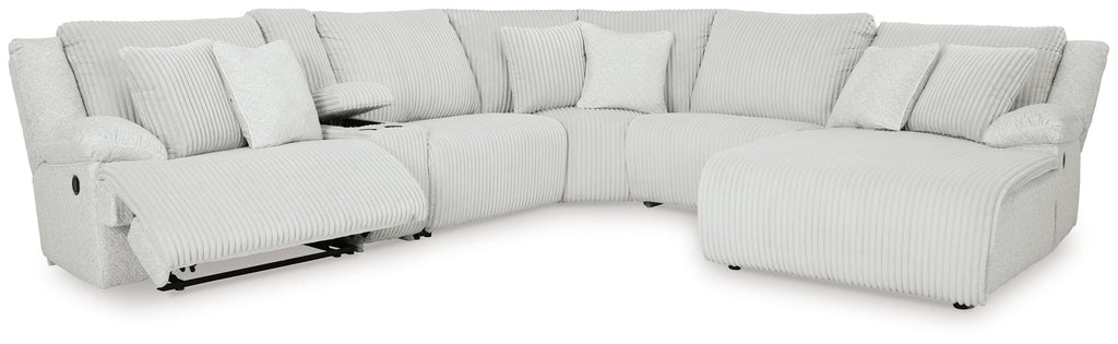 Light gray reclining sectional sofa with striped fabric and curved arm cushions