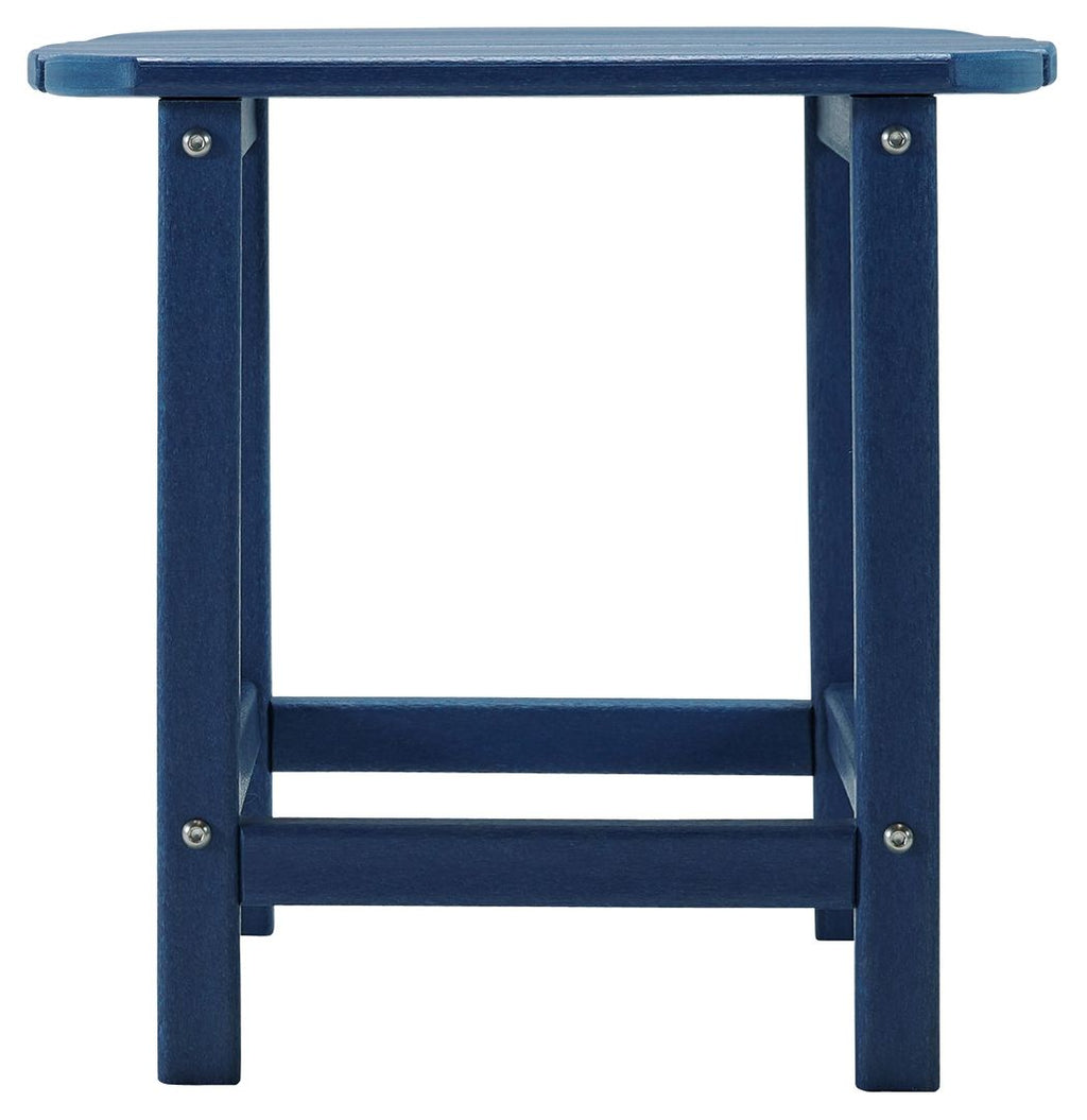 Outdoor end table in navy blue with slatted top and open lower shelf