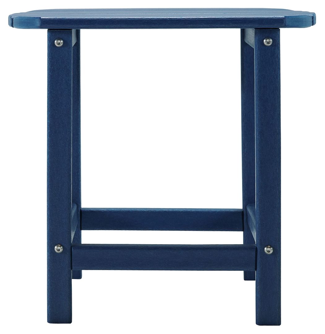 Outdoor end table in navy blue with slatted top and open lower shelf
