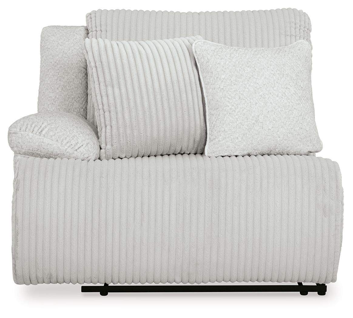Light gray ribbed recliner with bolster pillows and thick seat cushion