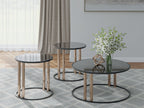 Nested round black occasional tables set of 3 with dark glass tops and gold legs