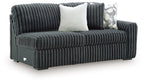 Gunmetal corded sofa with ribbed upholstery, square arms, and two throw pillows