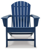 Outdoor adirondack chair, blue slatted seat, back, and side armrests