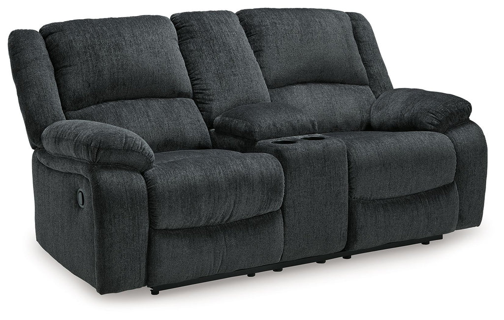 Dark gray reclining loveseat with padded arms and split back cushions