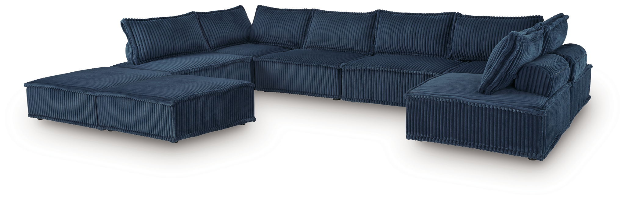 Navy modular sectional sofa with chaise and tufted cushions, angled layout