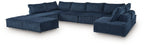 Navy modular sectional sofa with chaise and tufted back cushions, sectional layout