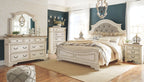 Two-tone dresser with large framed mirror and drawer storage