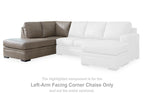 White L-shaped corner chaise with three seat sections and tufted back cushions.