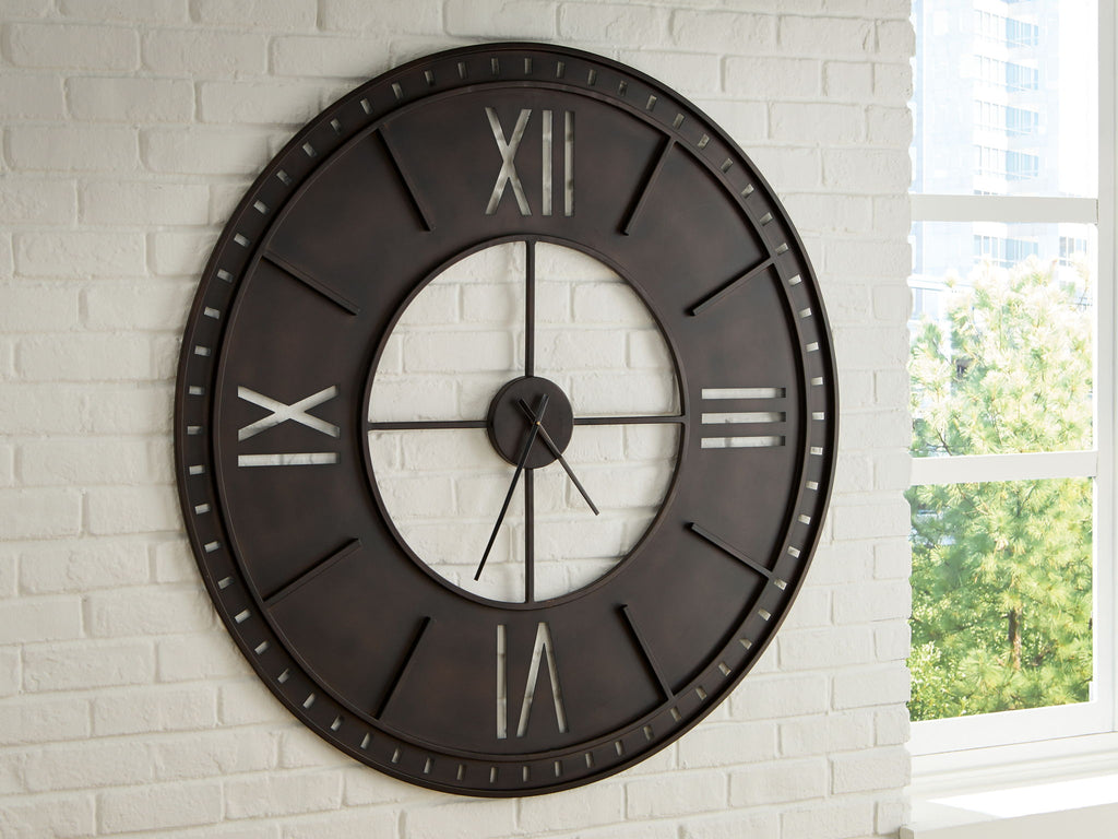 Antique brown wall clock with roman numerals and black hands mounted on wall