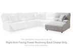 Pewter fabric power reclining chaise with patterned back pillow on sectional