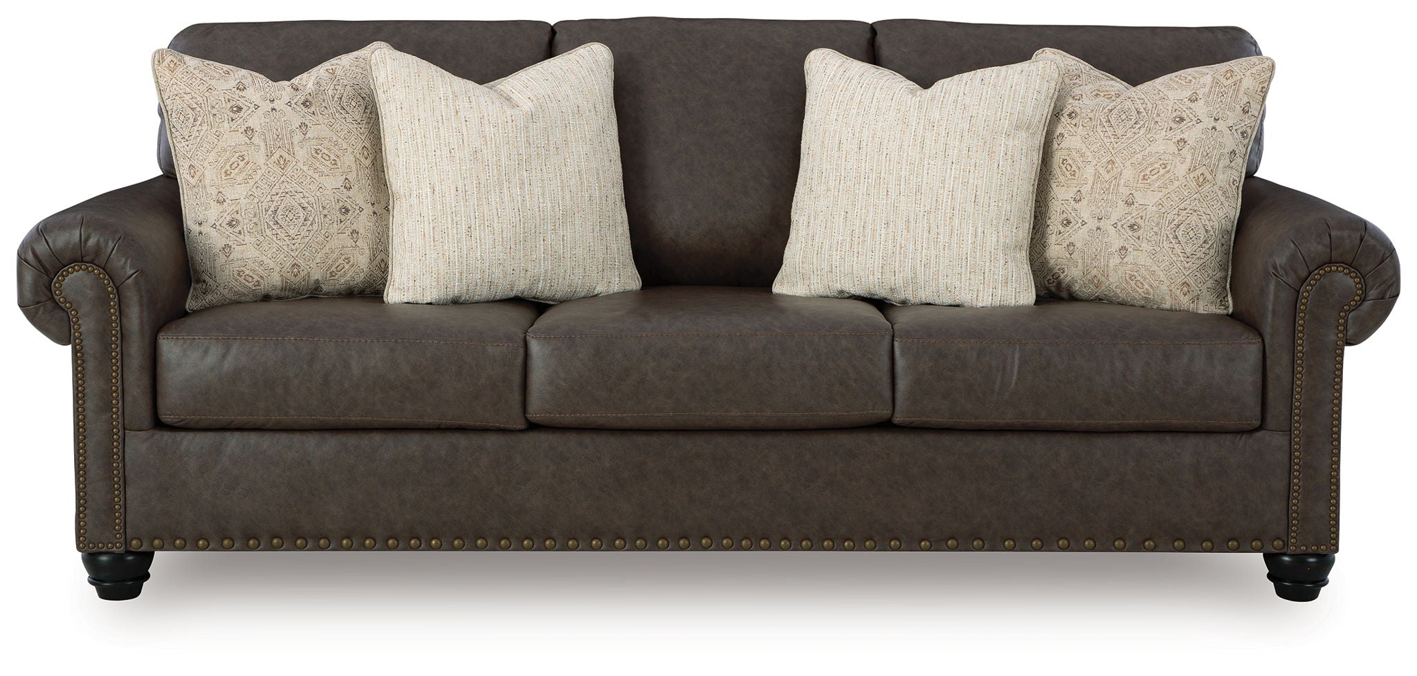 Dark brown upholstered sofa with three seats and two patterned accent pillows.