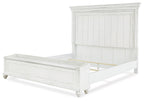 White panel bed base with open storage platform and matching panel headboard.