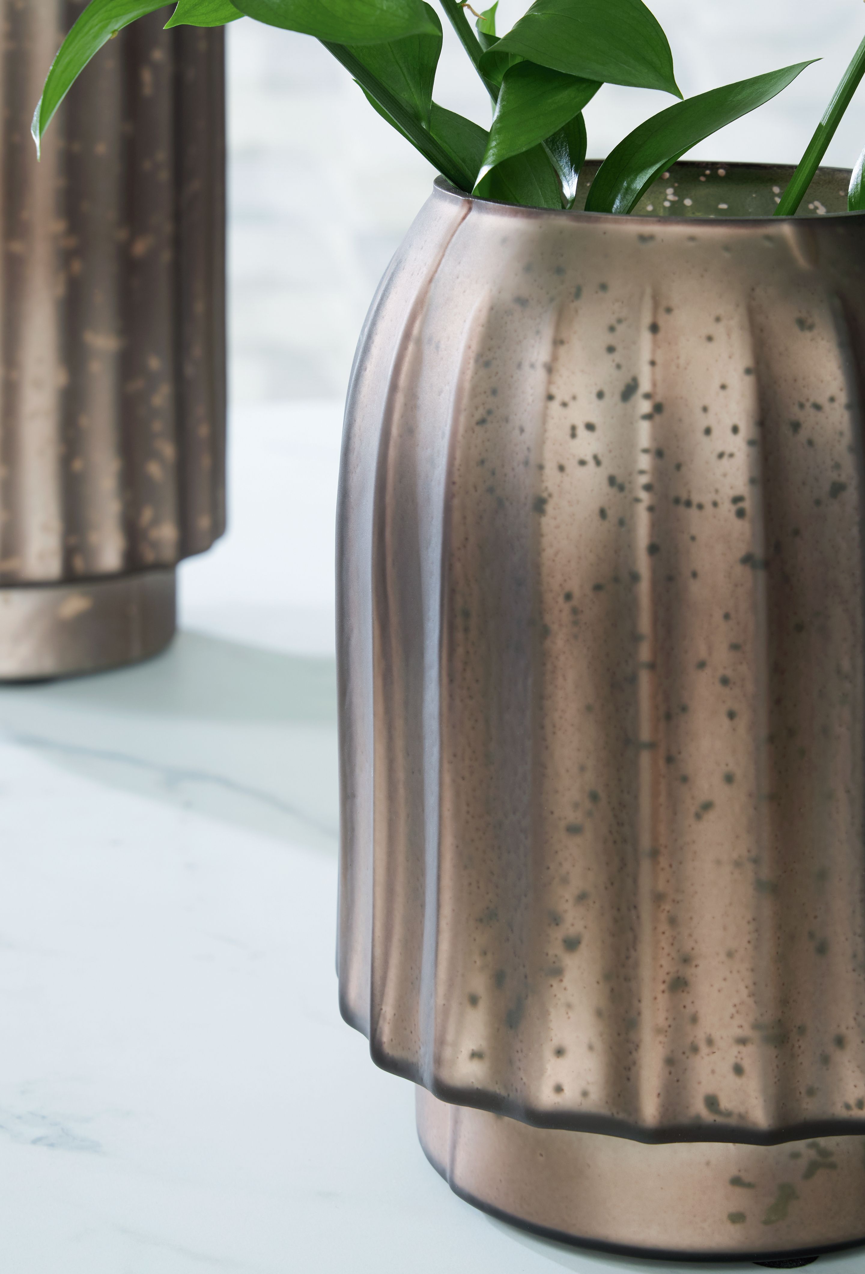 Metal vase, dark bronze, fluted surface with wide opening
