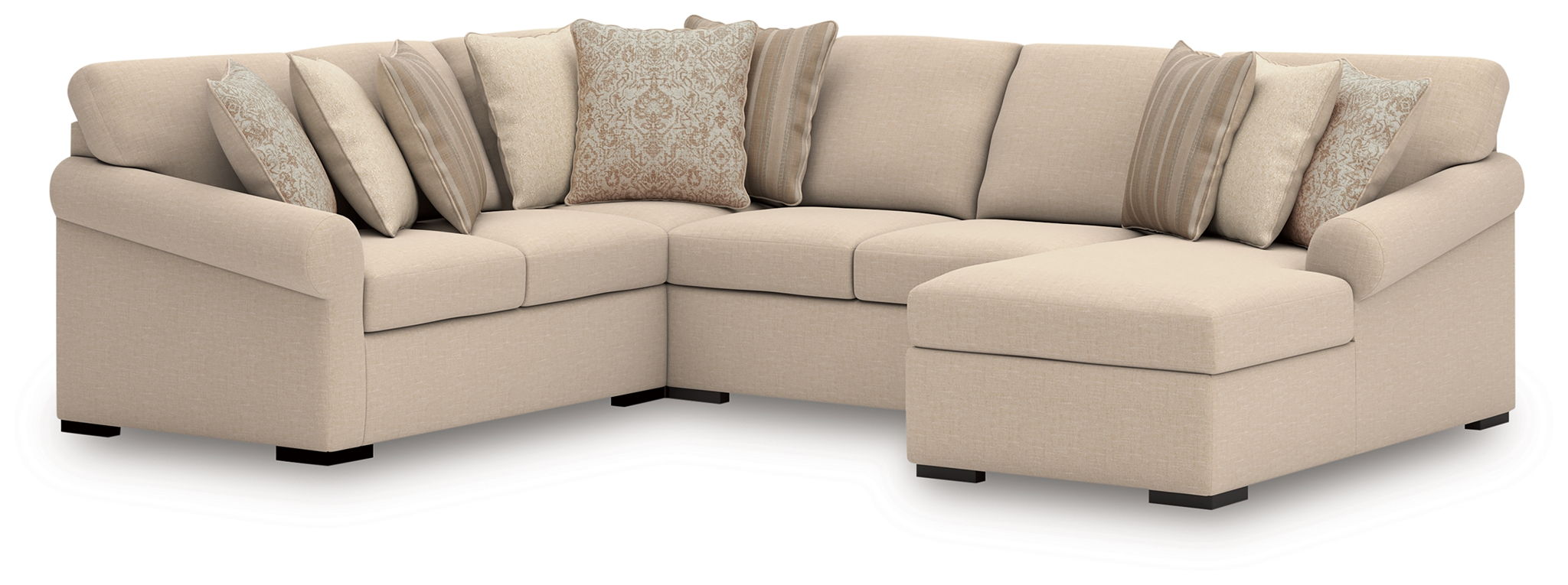 Upholstered sectional chaise with corner seat, cream fabric and multiple decorative pillows