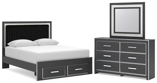Black upholstered panel bed with under-drawer storage and matching dresser with mirror