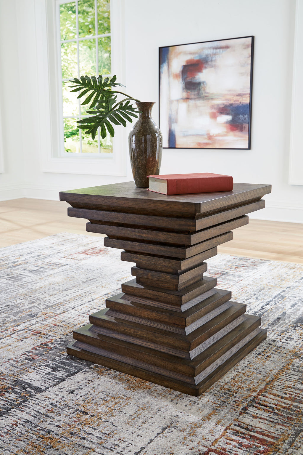 Warm brown square end table with stacked plank base and flat tabletop