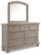 Gray dresser with arched mirror, three drawers and two cabinet doors