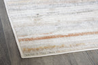 Artney rug corner close-up with light brown and gray horizontal stripes