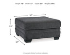 Slate gray upholstered ottoman with size labels: 19 in height, 37 in width, 37 in depth