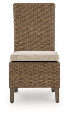 Woven side chair with beige cushion and dark wooden legs