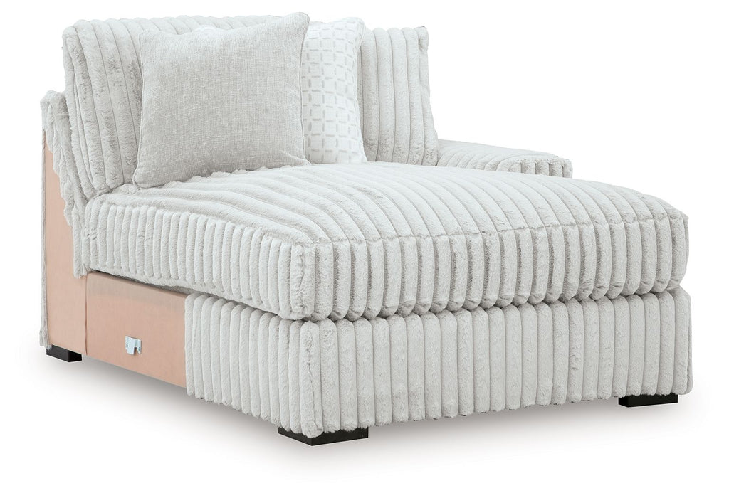 Light gray chaise lounge side view with ribbed base and seat cushions