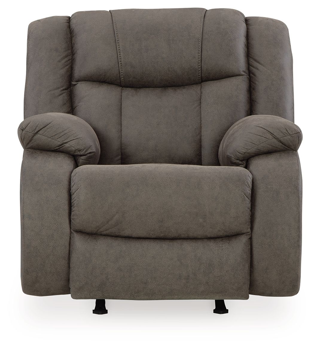 Gunmetal gray rocker recliner with padded backrest, curved armrests, and two legs
