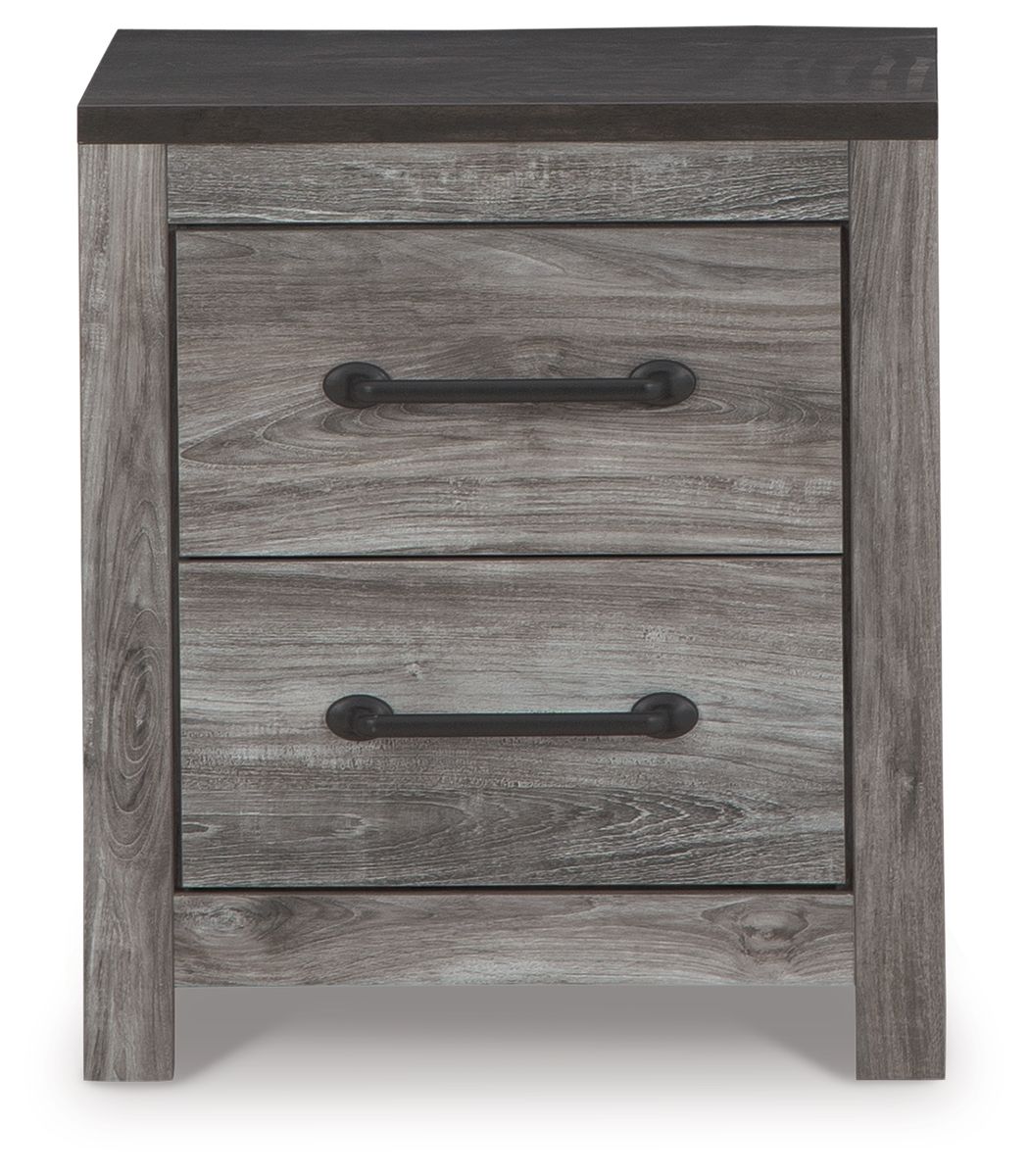 Two-drawer night stand close-up with gray woodgrain drawers and black pull handles.