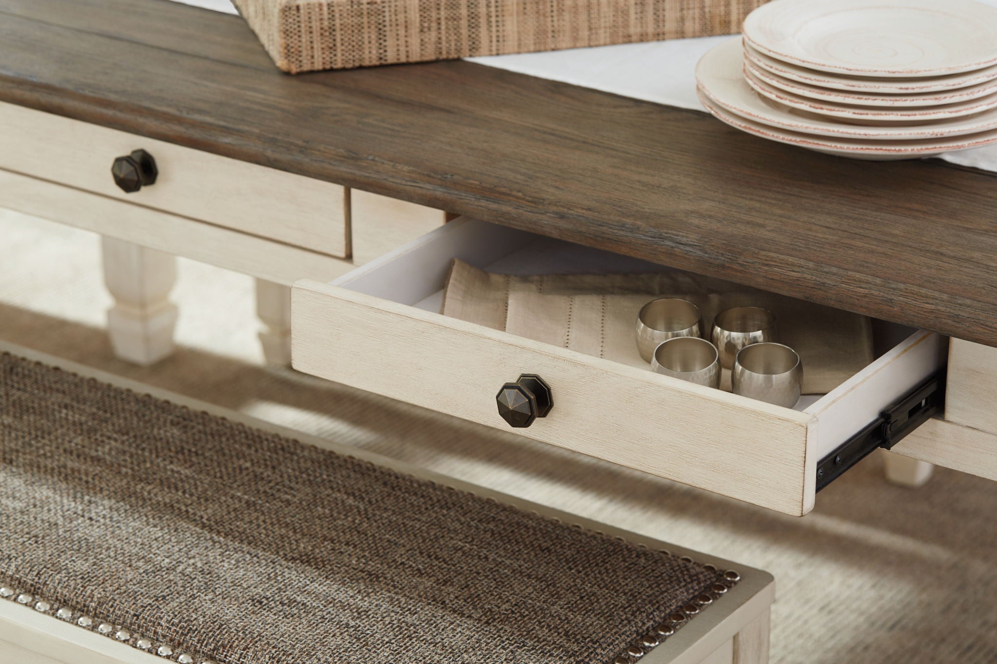 Rectangular dining room table open drawer with dark tabletop and beige base