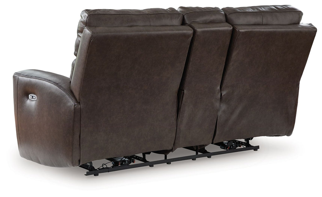 Dark brown power reclining loveseat with exposed footrest mechanism under seat
