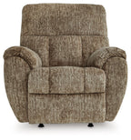 Taupe rocker recliner chair with wide padded arms and split back cushions