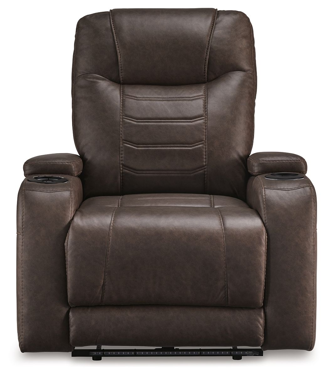 Dark brown power recliner with adjustable headrest, padded armrests, and centered footrest