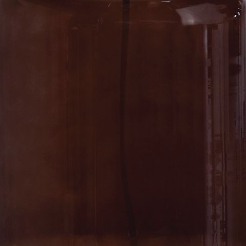 Close-up of brown glass table lamp body with glossy finish