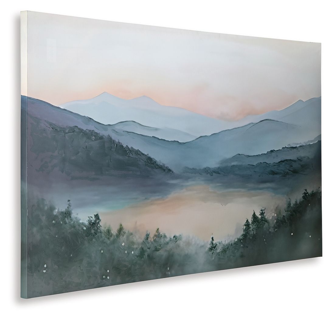Framed landscape wall art showing misty mountain ranges and forest silhouettes
